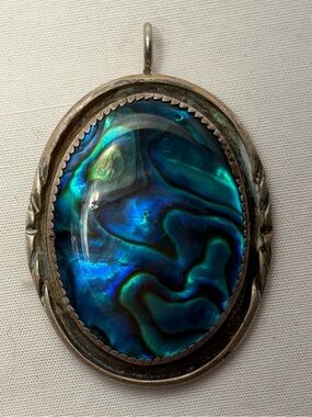 Vintage abalone shell pendant framed in sterling silver Fox mark